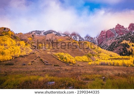 Colorado autumn scene in the White River National Forest opposite the Maroon Bells Royalty-Free Stock Photo #2390344335