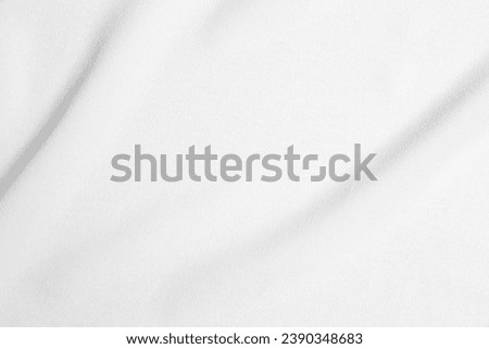 Abstract White Satin Silky Cloth for background, Fabric Textile Drape with Crease Wavy Folds.with soft waves. Cloth texture.