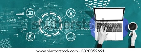 Fingerprint scanning theme with person using a laptop computer