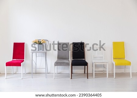 yellow red grey black white chairs with flowers on white background interior