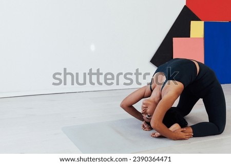 woman doing exercises yoga asana lotus pose workout