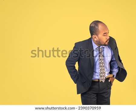 businessman photograph with isolated yellow background