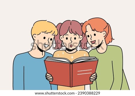 Children read book and are amazed at facts from history described in school encyclopedia. Boy and two pre-teen girls look with interest at book while visiting library or bookstore. Royalty-Free Stock Photo #2390388229
