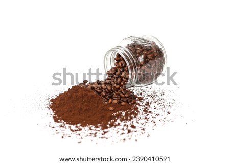 Powder coffee and coffee beans spread out of bottles. Concept photo of isolated picture style.
