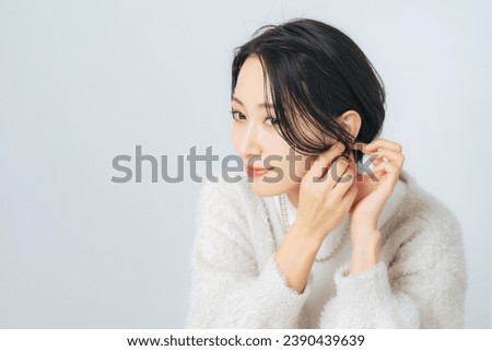 Beauty portrait of middle aged Asian woman for skin care and cosmetics concept. Royalty-Free Stock Photo #2390439639
