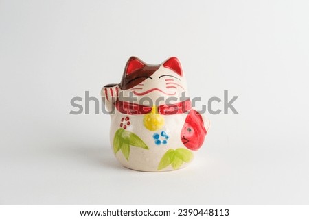 Chinese waving cat statue for decoration in home or office that can bring you a luck. 