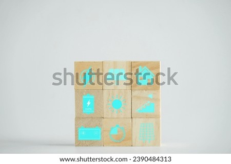 energy concept Energy saving icon on wooden block. White background.