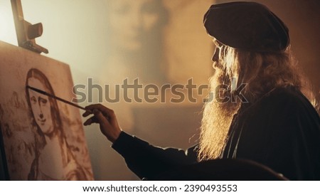 Re-enactment Documentary Scene for The Process of the Creation of the Mona Lisa Painting: The Genius Leonardo da Vinci Making the First Layer of Shadow of his Masterpiece on Canvas in his Art Workshop Royalty-Free Stock Photo #2390493553