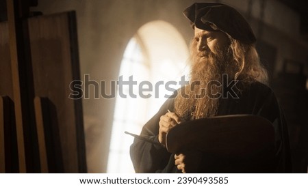 Representation of Historical Era: Wide Portrait of the Genius Leonardo Da Vinci Painting his Muse and Creating a Masterpiece in his Art Workshop. Talented Renaissance Painter Practicing his Craft Royalty-Free Stock Photo #2390493585