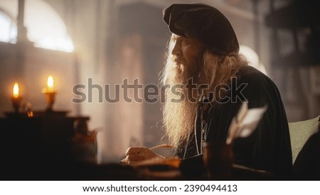 Portrait of an Old Renaissance Male Inventor Writing and Thinking about New Ideas. Genius Author Working on his Next Book, Writing a Play, Being Creative and Innovative. Artist Feeling Inspired Royalty-Free Stock Photo #2390494413