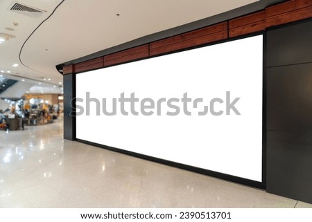 Mockup of a blank store front billboard in a shopping mall. Perfect for showcasing your logo and branding.
