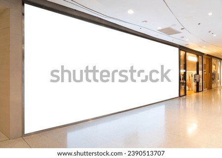 Mockup of a blank billboard store front sign in a shopping mall. Perfect for showcasing your logo and branding.