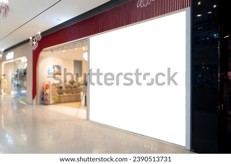 Mockup of a blank billboard store front sign in a shopping mall. Perfect for showcasing your logo and branding.