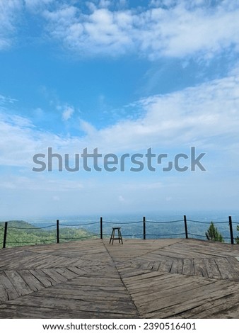 natural view on a hill with a wooden terrace
