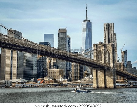 View of the Famous Skyline of New-York downtown with Brooklyn Bridge Tower and One World Trade Center in the background