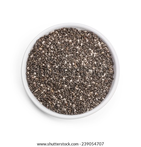 Chia seeds in bowl, isolated on white background. Royalty-Free Stock Photo #239054707