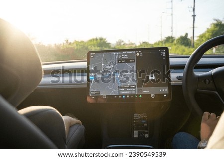 Smart asian tourist woman use car navigator GPS travel on local road summer vacation with car Royalty-Free Stock Photo #2390549539
