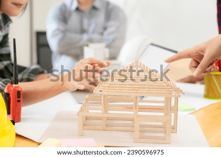 The collaborative work of a group of architects inspecting the structural integrity of a building they have designed