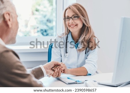 Healthcare of old people. Helping senior man holding hand of doctor. Support hope concept. Telling diagnosis. Assisting elderly patient. Caregiver. Trust in hospital clinic Royalty-Free Stock Photo #2390598657