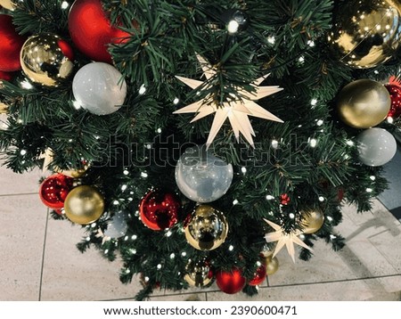 Christmas trees with colorful balls close-up