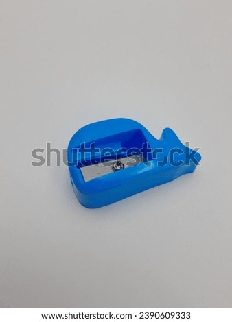single blue sharpener isolated on white background