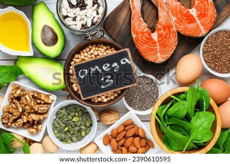 Food rich in omega 3 fatty acid and healthy fats. Healthy keto and low carb diet eating concept. top view Royalty-Free Stock Photo #2390610595