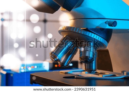 Virology: Optical microscopes help virologists visualize viruses, study their structure, replication, and interactions with host cells. Royalty-Free Stock Photo #2390631951