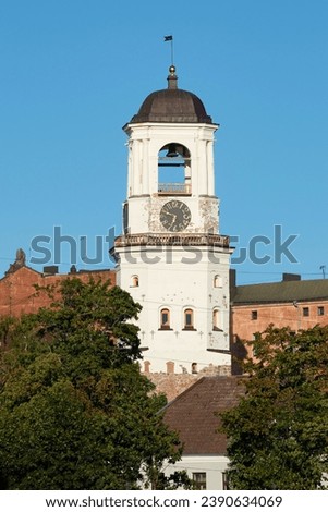 View of the ancient Clock Tower on a sunny August day. Vyborg, Russia Royalty-Free Stock Photo #2390634069