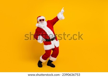 Full size profile portrait of grandfather santa dance direct finger empty space new year eve sale isolated on yellow color background