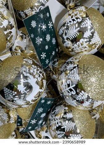 Golden Christmas balls with deer vertical
