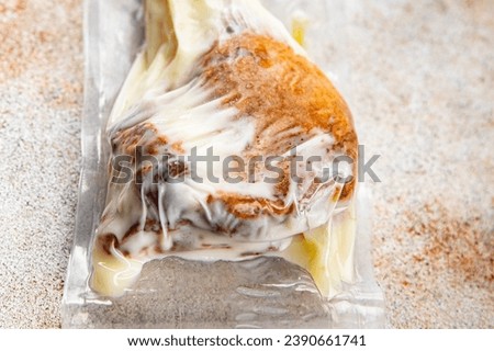 duck leg semifinished half cooked duck meat confit delicious eating cooking meal food snack on the table copy space food background rustic top view Royalty-Free Stock Photo #2390661741