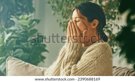 Young beautiful smiling yawn woman. Raising arms stretching back muscles, yawns, enjoying carefree peaceful weekend relaxation time alone in living room. Relax, calm, rest, peace, happiness