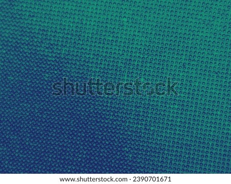 Closeup of real vintage comic book page with a pattern of blue green dots from the printing process on paper background Royalty-Free Stock Photo #2390701671