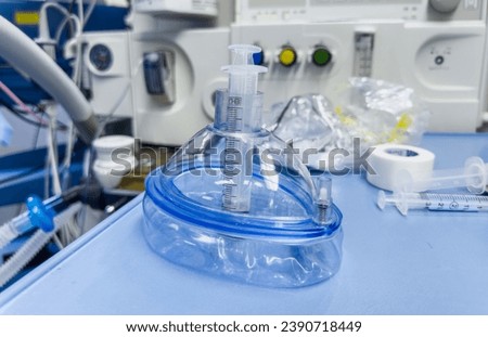 medical equipment for airway management, endotracheal tubes, oral airways, and masks in a hospital setting Royalty-Free Stock Photo #2390718449