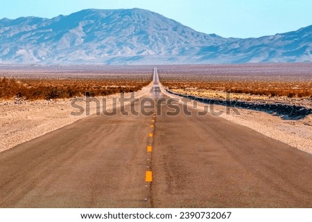 Depth of Field Road, Mysterious and Mysterious Death Valley California Royalty-Free Stock Photo #2390732067