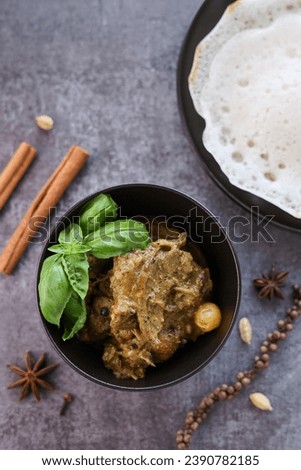 A traditional duck curry with appam. Appam or Palappam is one of the most popular and traditional Kerala brakefast bread