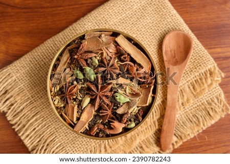 Indian spices. Indian spicy curry masala for making curry in India. Masala tea Ayurvedic medicine used in India. Ayurveda for good health. Garam masala for meat dishes cinnamon cardamom star anise. Royalty-Free Stock Photo #2390782243