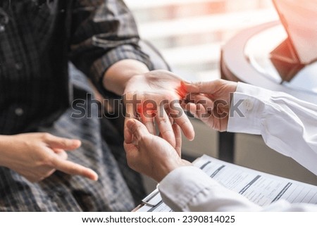 Trigger finger, locking finger or stenosing tenosynovitis disorder with painful joint thumb area, palm and wrist pain, stuck problem on bent position on patient hand and finger Royalty-Free Stock Photo #2390814025