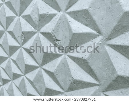 Patterned white concrete fence as background. Texture.