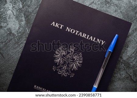 Notarial act, instrument or writing in Poland. Written document signed by a notary public. Akt notarialny in Polish language, means Notarial act, Kancelaria notarialna is Notary office. Royalty-Free Stock Photo #2390858771