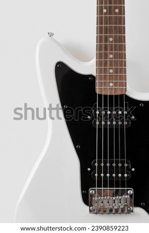 White electric guitar. Musical instrument