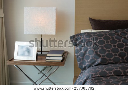 modern luxury bedroom with pillows and lamp