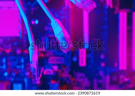Modern technology network cable in neon light.
