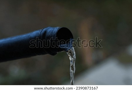                               Water flows from the black hose