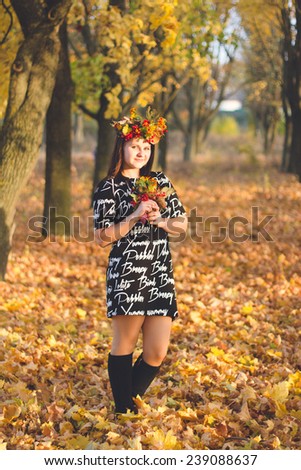 The girl in the autumn park