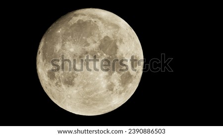 Photography of Moon in the full moon lunar phase.