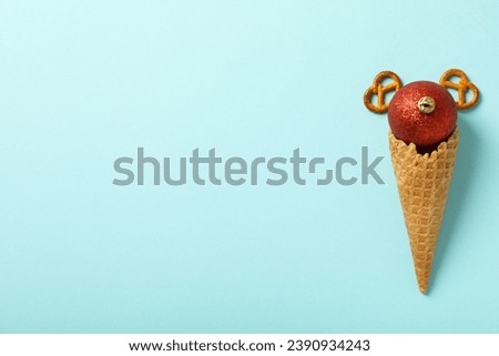 Ice cream cone with a decorative ball