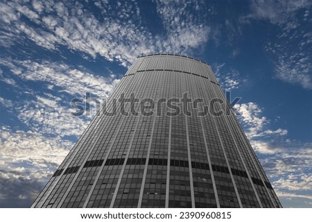 Skyscrapers La Defense (against the background of sky with clouds), commercial and business center of Paris, France