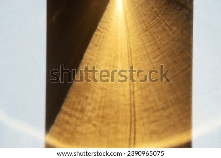 Abstract yellow gold caustic strobe prism texture overlay. Summer copy paste background