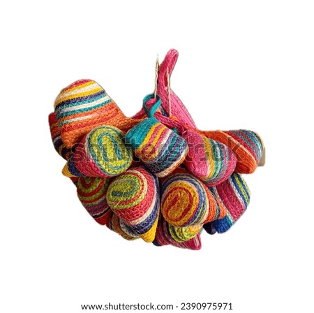 a colorful easter egg made of yarn.